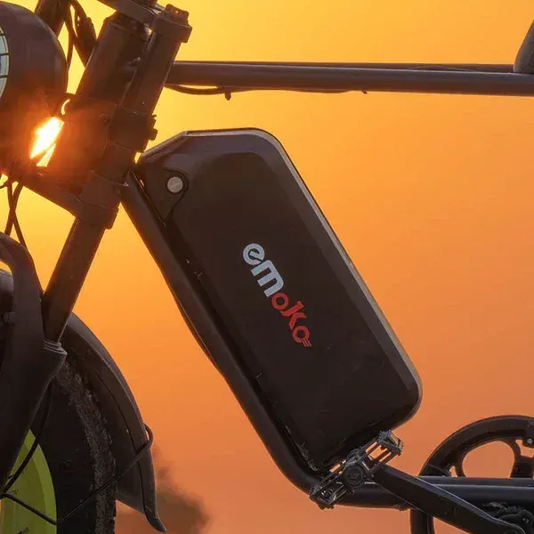 Emoko C91 battery pack mounted on the frame, with charging port visible.