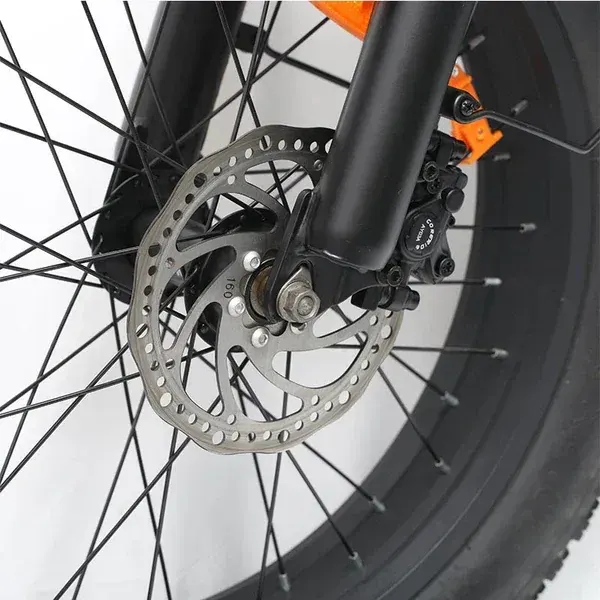 Emoko C91 front and rear disc brakes, close-up on the rotor.