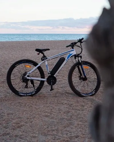 Fafrees F28 electric bike partially assembled with tools and adjustments visible