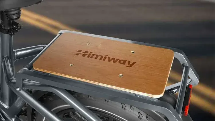 Himiway Big Dog's 250W motor hub and Kenda fat tire, providing traction on various terrains.