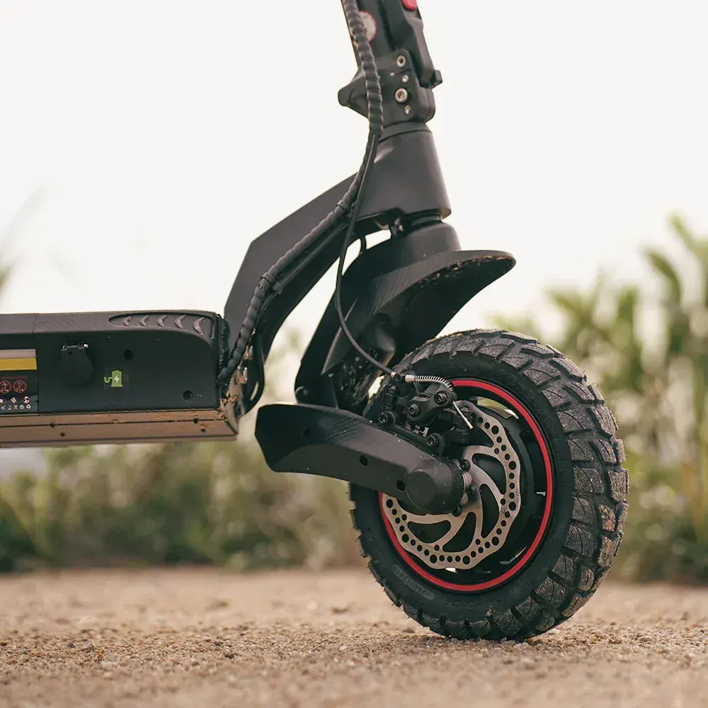 iScooter iX7Pro folded in 3 steps for easy storage and transport in a car trunk