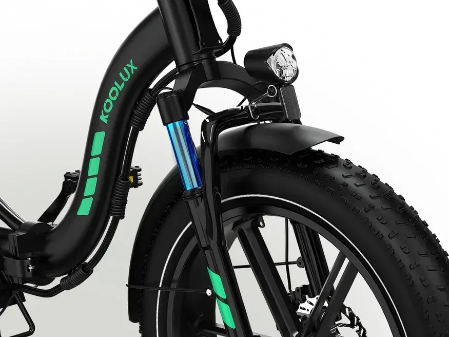 Koolux BK6S 4.0 folding e-bike in full side view, black frame, fat tires, and front suspension.