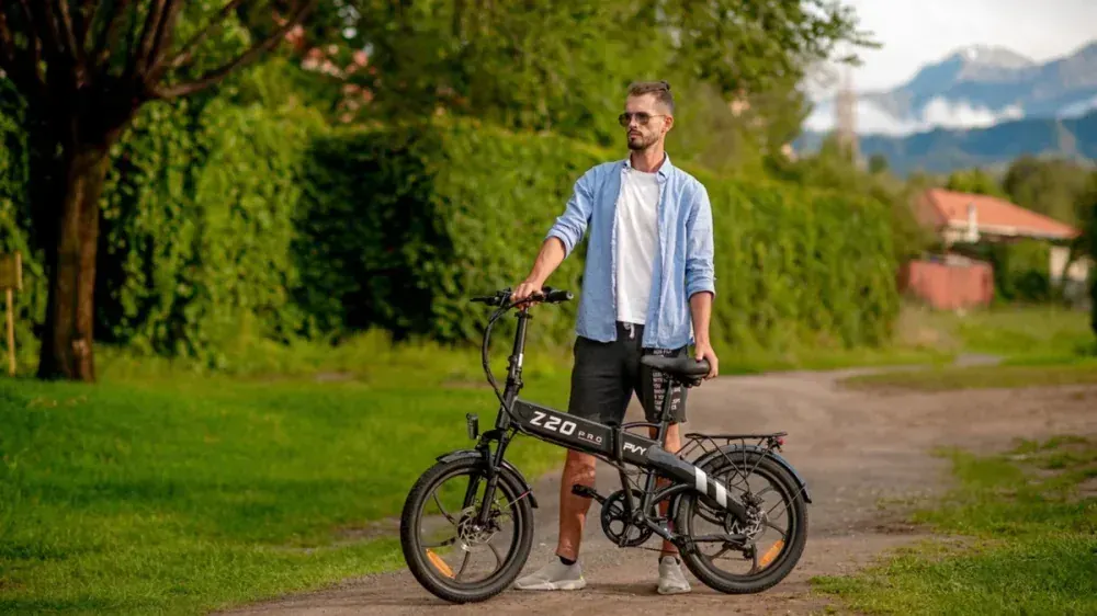 PVY Z20 PRO battery pack mounted on frame, red bike, charging port visible